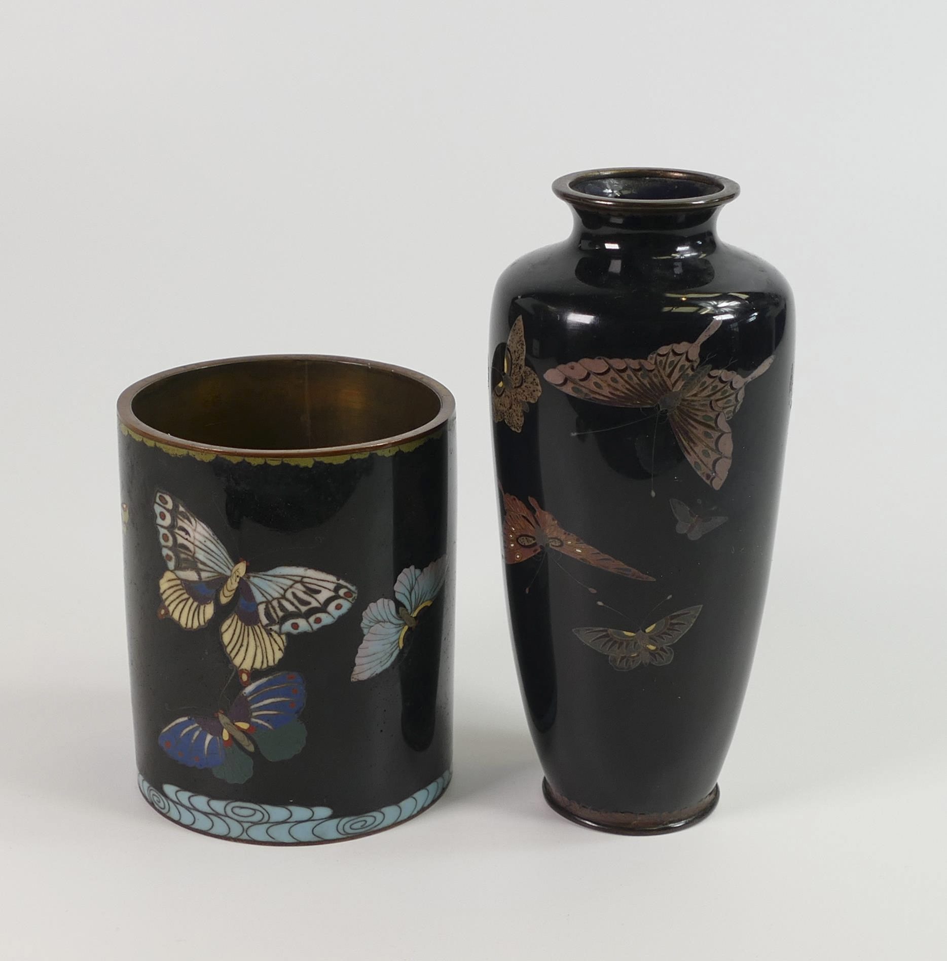Lot 587 was a Cloisonne Enamel Vase & Pot decorated with butterflies that found a hammer price of £300.