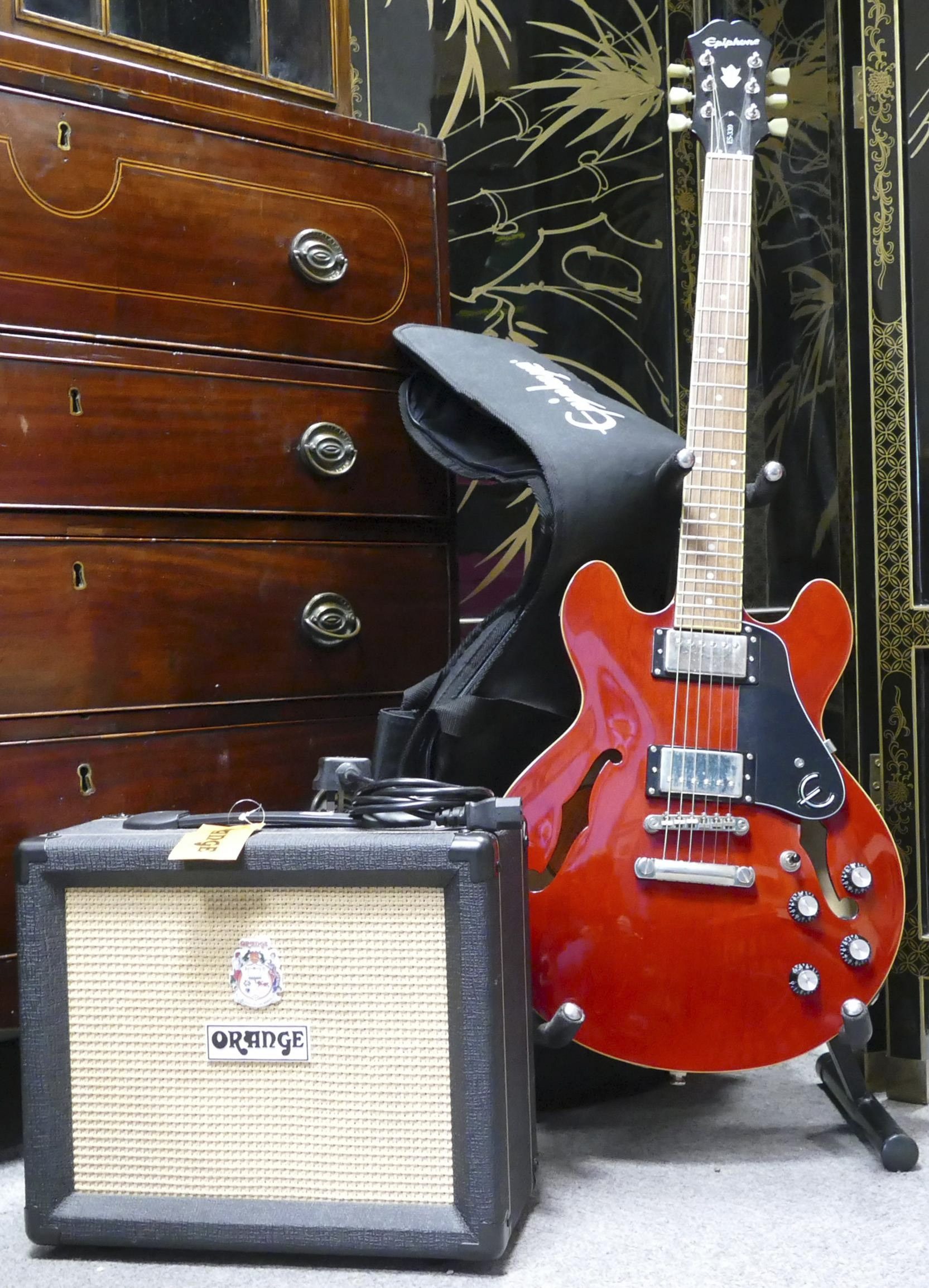 Lot 633 was an Epiphone guitar model ES 339 Ch in cherry red together with an Orange Crush 20 amplifier, complete with stand and lead, that found a new home for £280.