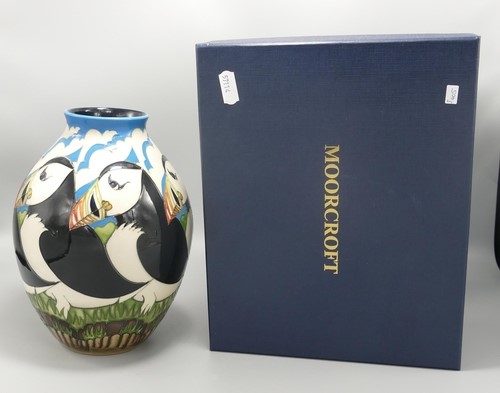 A boxed Moorcroft Lindisfarne Puffins Vase