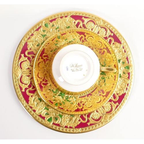 A set of De Lamerie Fine Bone China heavily gilded Majestic floral patterned dinner plates and matching dessert bowls