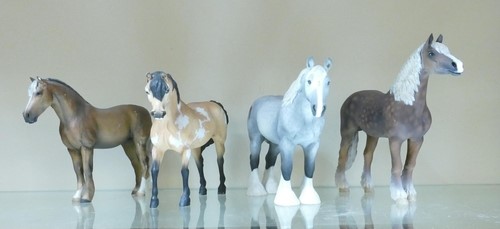 A collection of Northlight Group of Resin horse figures